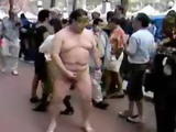 Fat Asian Guy Jerking On The Street While People Taking Pictures