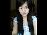 Cute chinese teen dancing on webcam